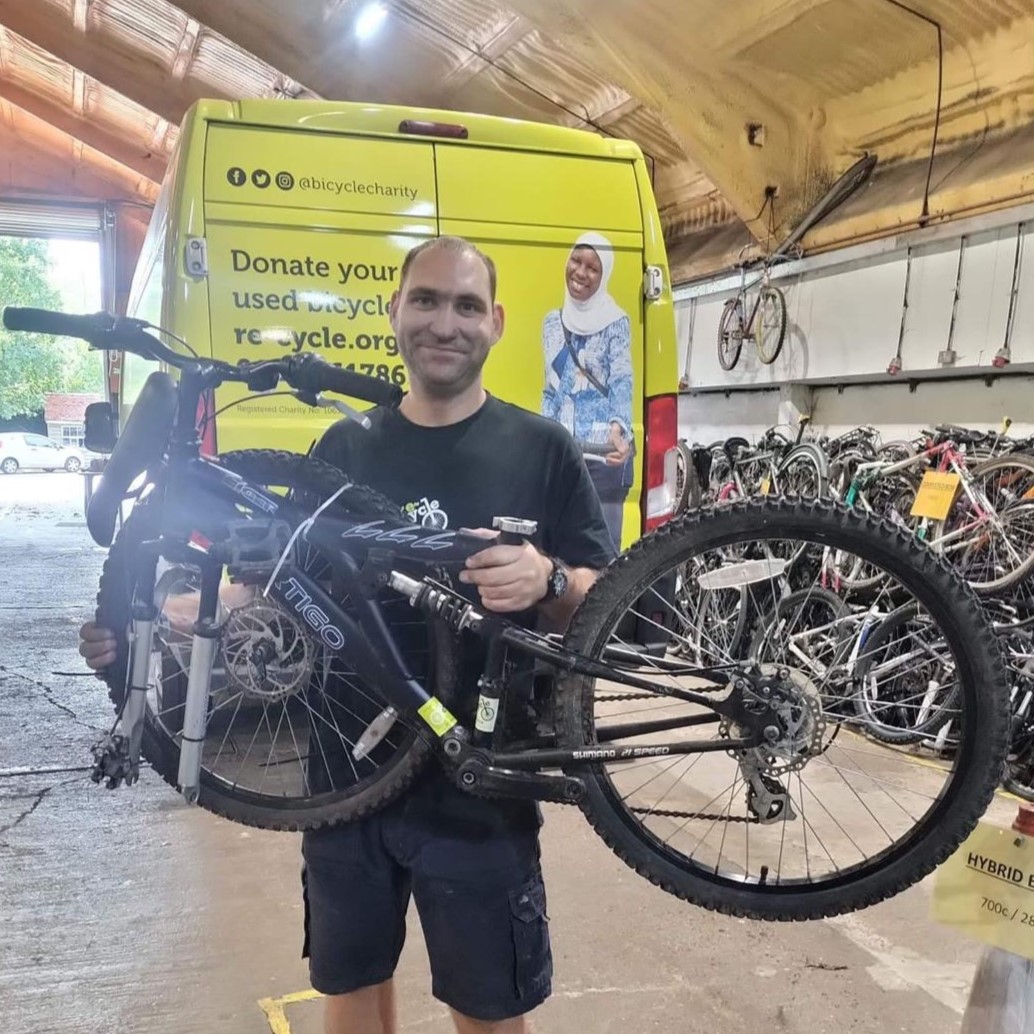 Ryan bicycle donation re-cycle bikes to Afirca van green