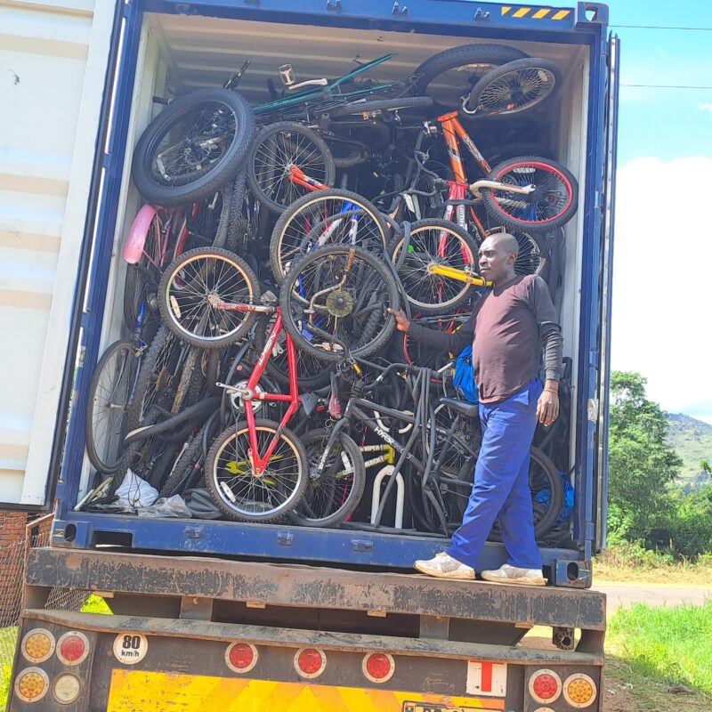 Unloading container of bicycle in Malawi