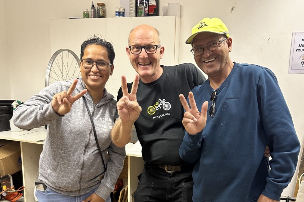 Ismail with his daughter and mark from re-cycle