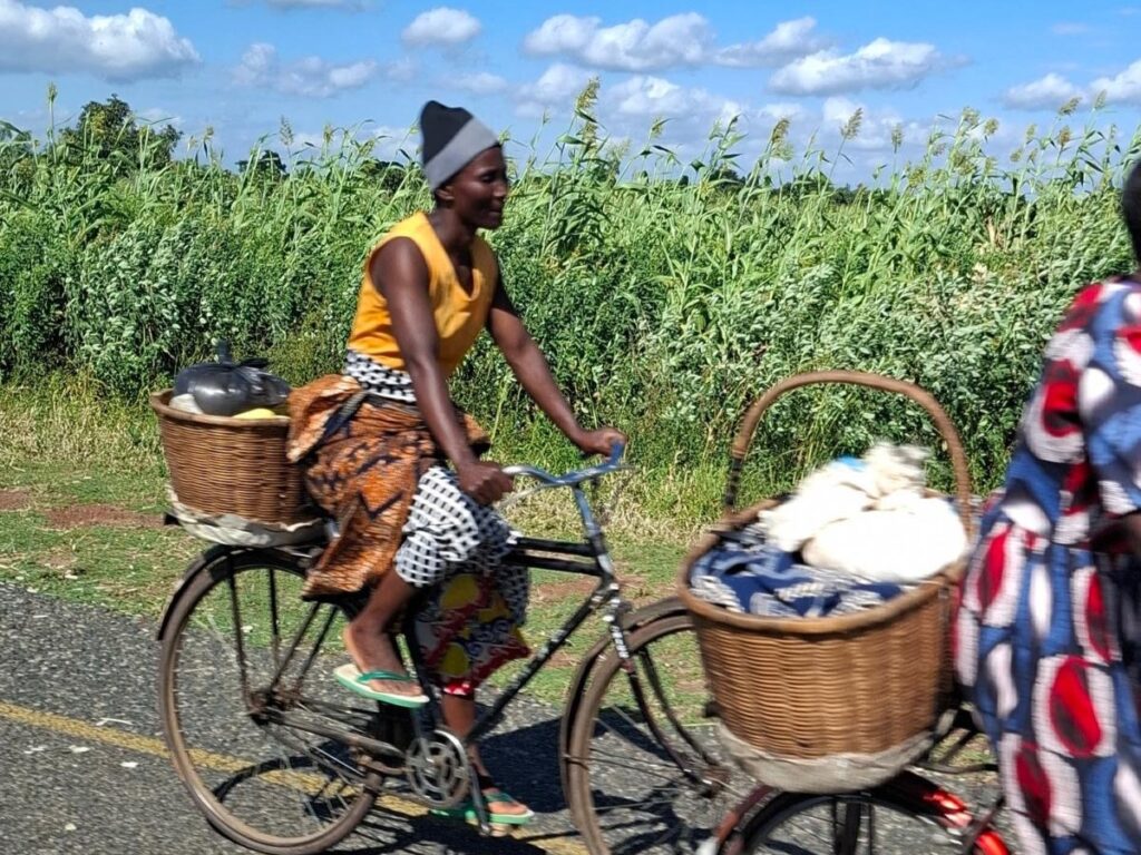 lady on bike malawi re-cycle charity essex