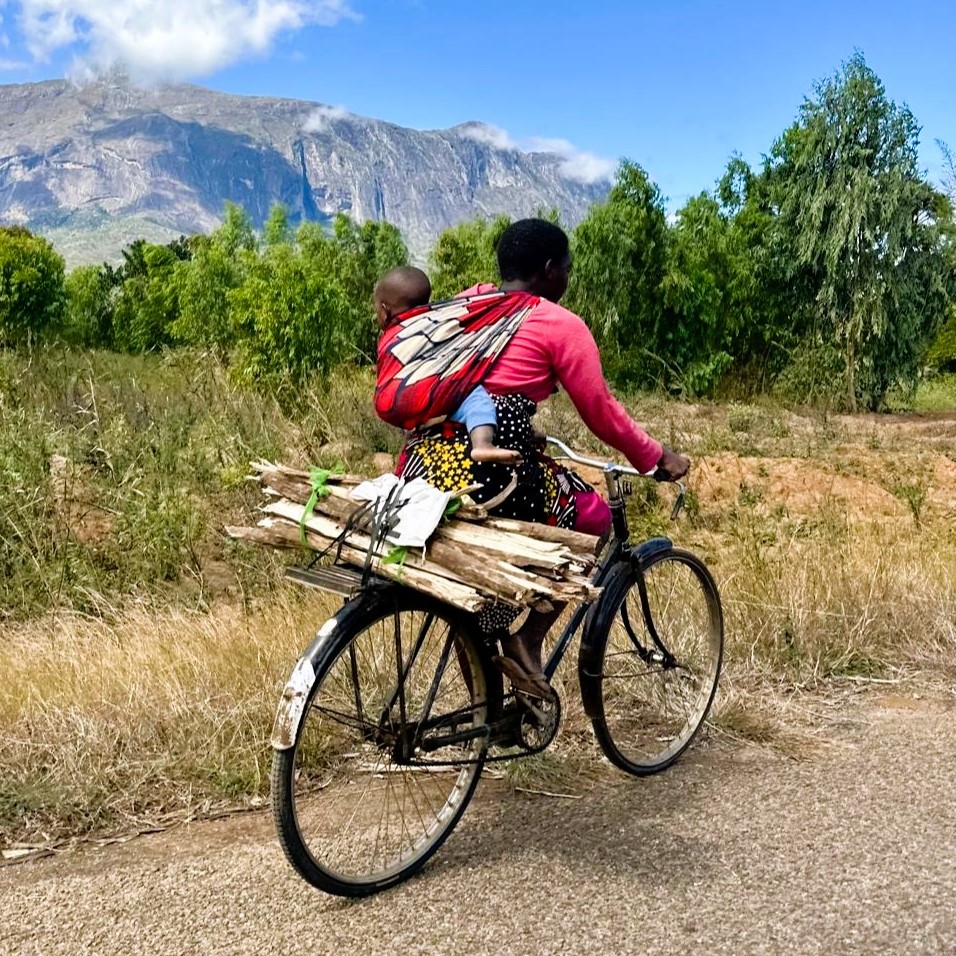 Lady on a bike in Malawi