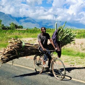 Man on bike farmer Malawi