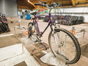 Bike in stand in warehouse donate