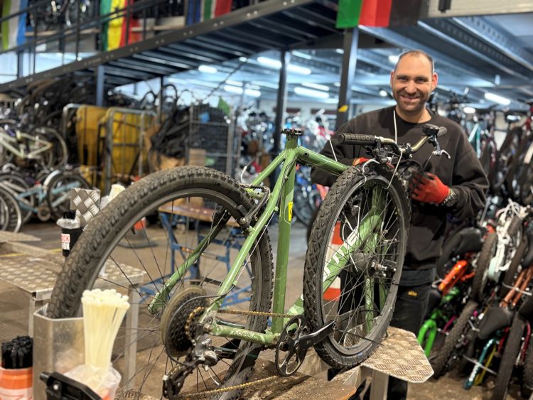 Volunteer warehouse prep bike essex